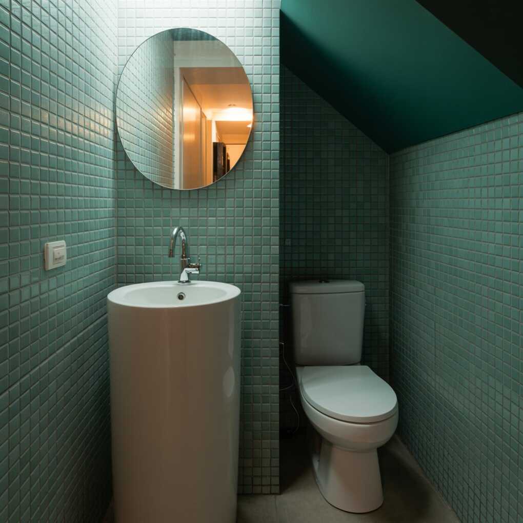 Small Modern Under Stair Powder Room