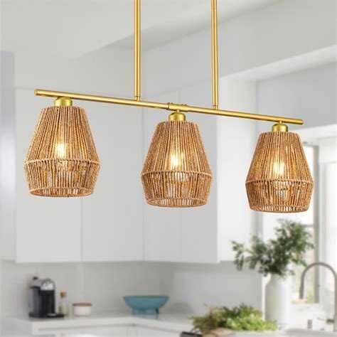 Boho pendant light hanging over a dining table at proper height